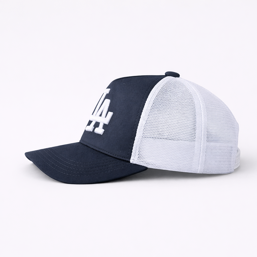 Pro Fit Snapback Trucker Hat side view showing curved bill and mesh back panel